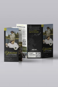 Tri-fold promotional brochure/display for Unmatched Fly Fishing Cancer Retreats, showing anglers on a river and bold branding.